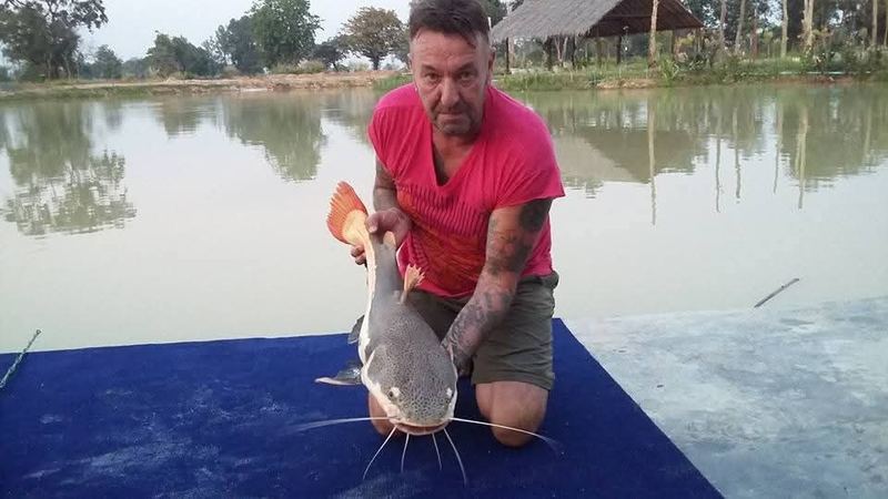 Khun Adrian with a redtail catfish